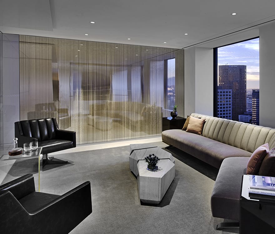 Archetype Glass' custom laminated wall panels and partition walls in the Paul Hastings law firm office