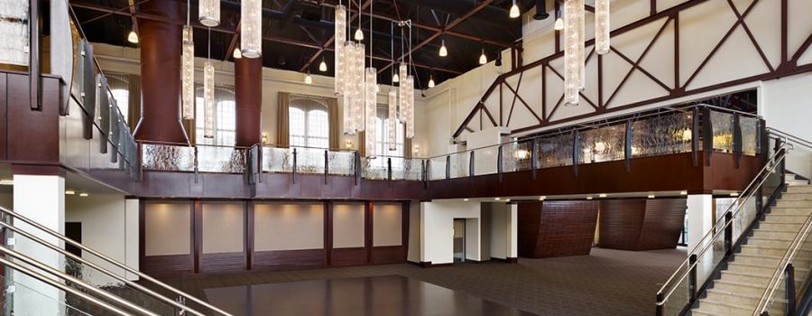 A wide view of the custom art glass railings at the Phoenixville Foundry, by Archetype Glass