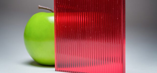 A full banner of the red ribbed custom laminated glass DU-5445, crafted by Archetype Glass for the Q2 2022 QSP