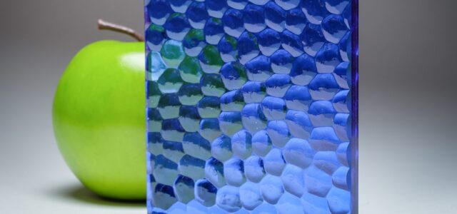 A full banner of the blue scalloped custom laminated glass FV-1914, crafted by Archetype Glass for the Q2 2022 QSP