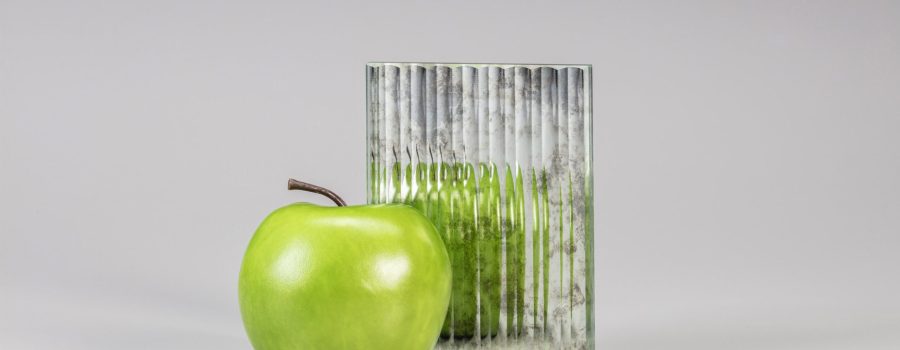 Archetype Glass' custom laminated antique mirror with fluted surface glass, part of the 2024 QSP First Quarter Collection