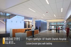 Custom frosted glass and graphic glass wall cladding and light box at the UF Shands Hospital, created by Archetype Glass