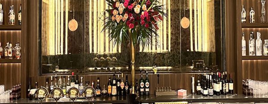 The Nightcap Lounge at the Nemacolin Resort, featuring Archetype Glass' custom laminated antique mirror